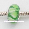 Verzilverde glasbedel Groen met witte vlammen