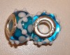 Glasbedel Turquoise met witte slinger