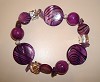 Armband van amethist, paars natuursteen en parelmoer