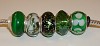 Set van 5 glasbedels in groen
