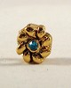 Vergulde bedel Bloem met blauw strass