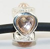 Sterling verzilverde bedel met perzikroze strass 