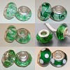 Set van 6 glasbedels in groen