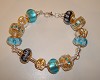 Pandora Style armband in turquoise-goud